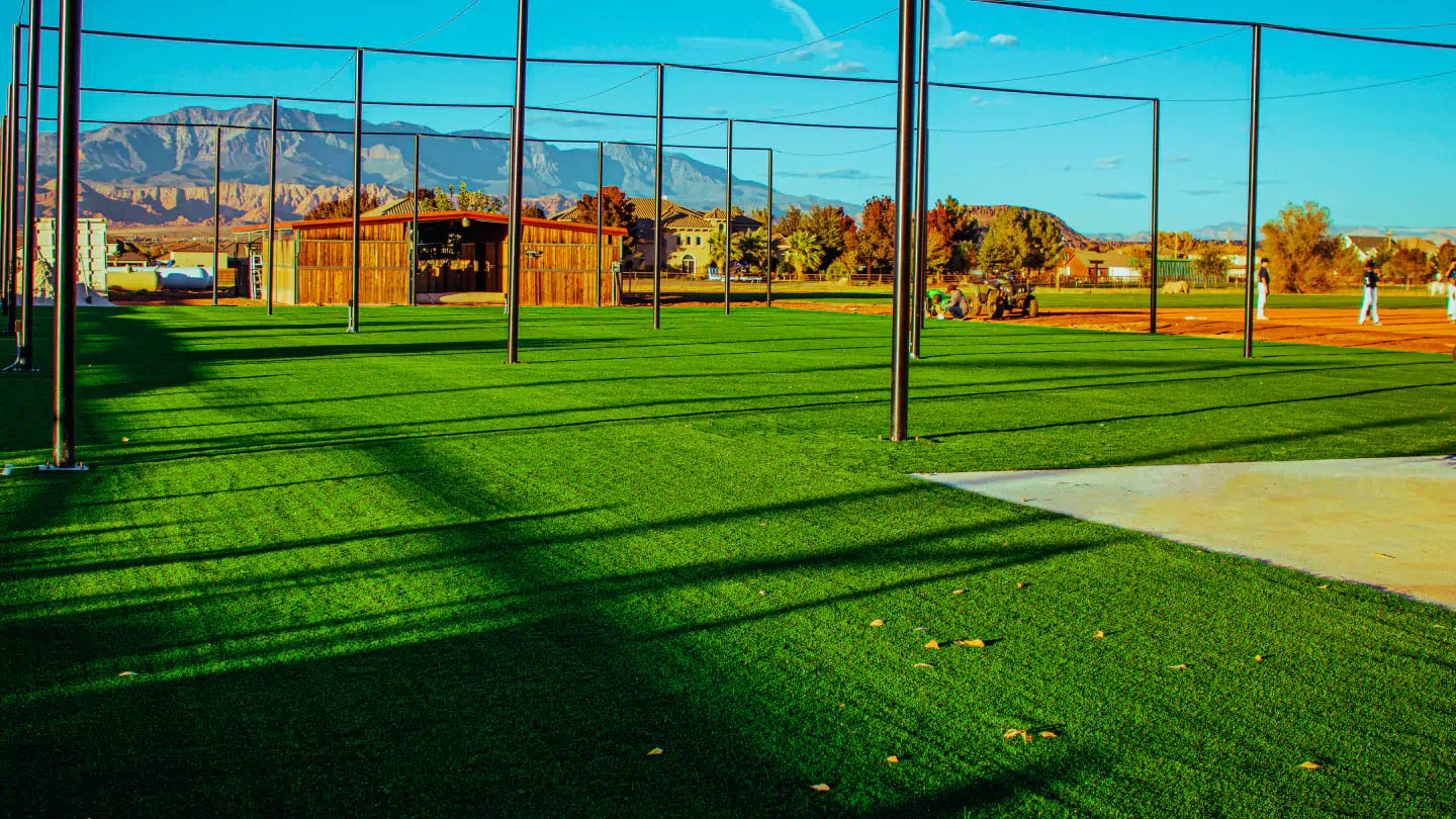 newly installed grass in a baseball facility without shadow